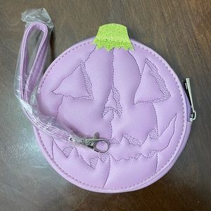 Love pain & stitches lavender pumpkin wristlet
